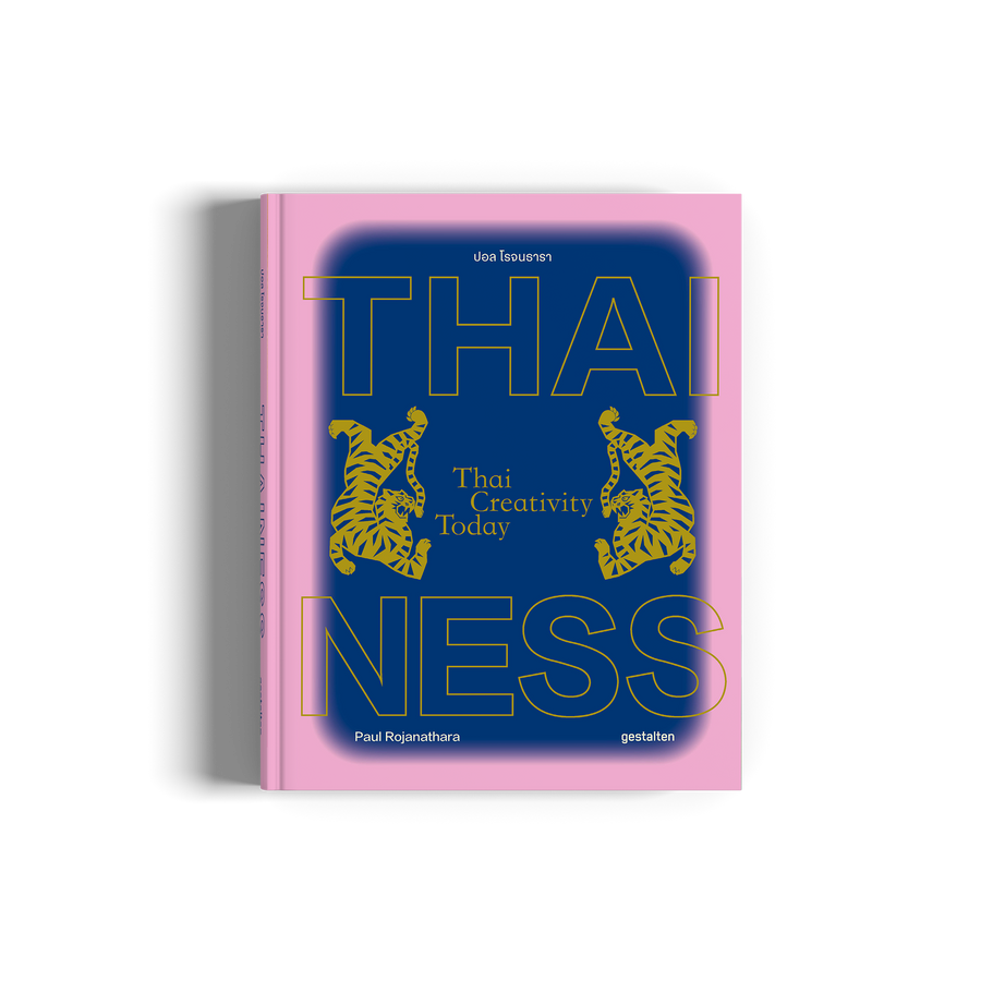 Book titled 'Thai Creativity Today' with pink and blue design on a white background