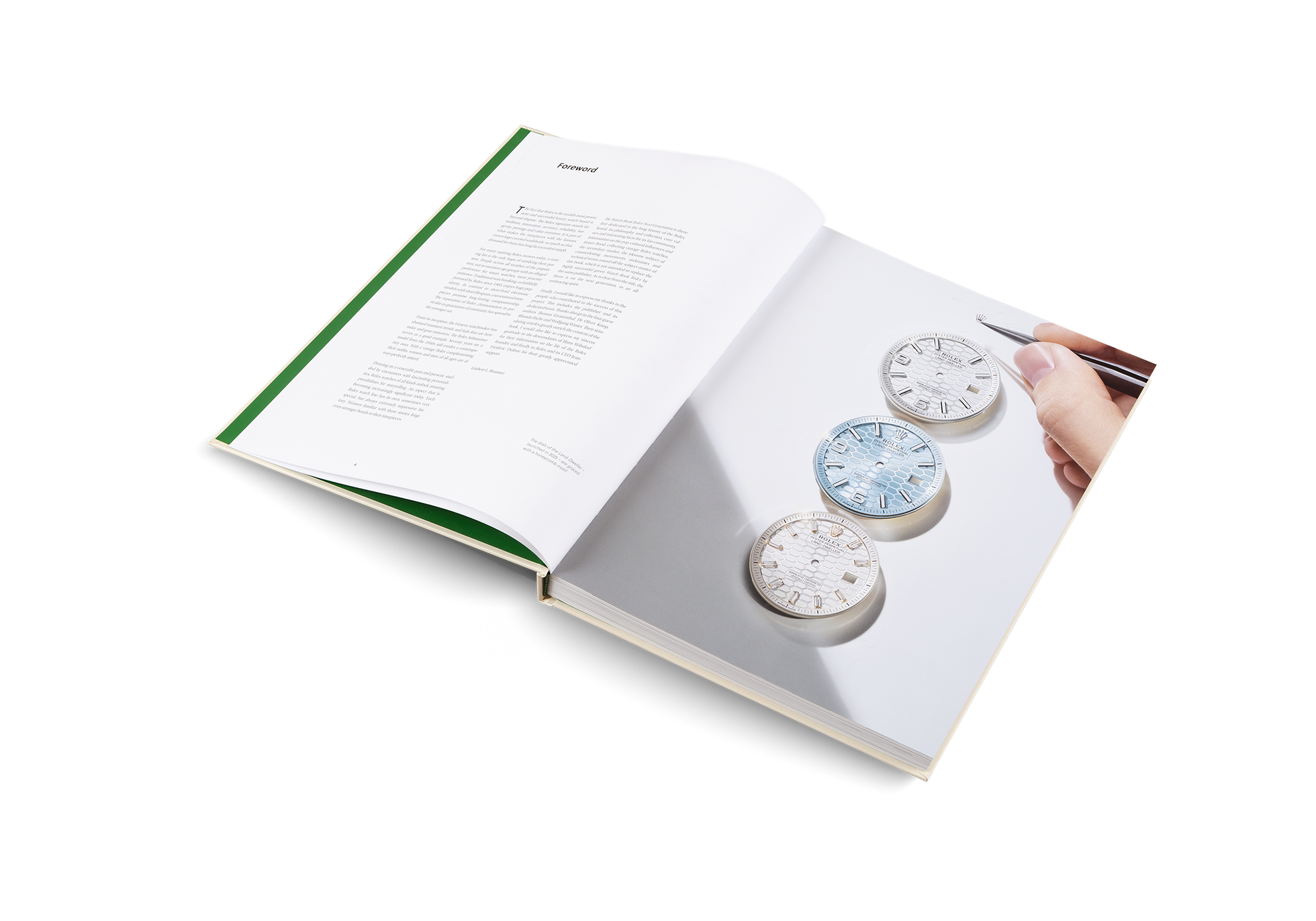 Open book with images of decorative clocks on a white background
