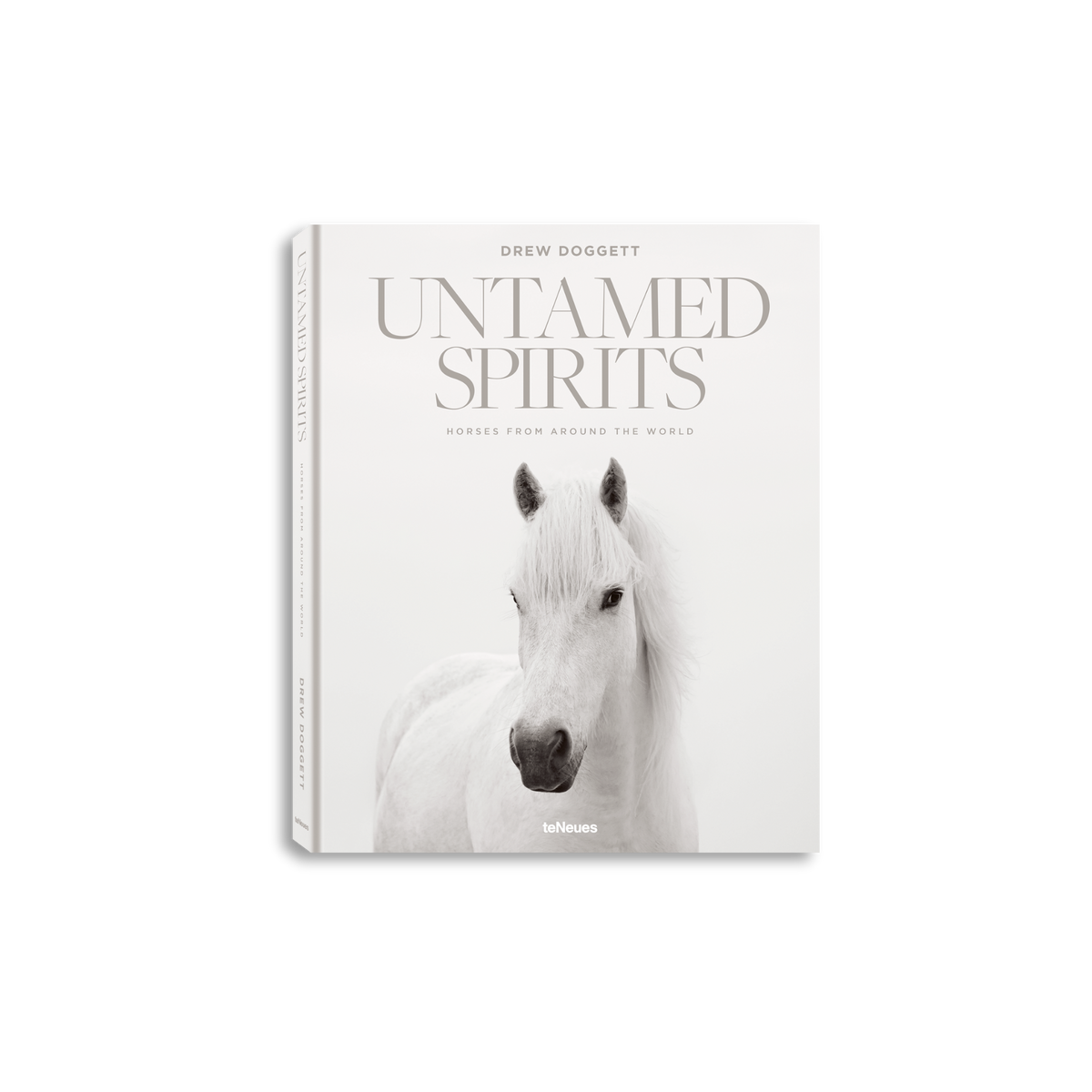 Book titled 'Untamed Spirits' with a white horse on the cover, on a white background