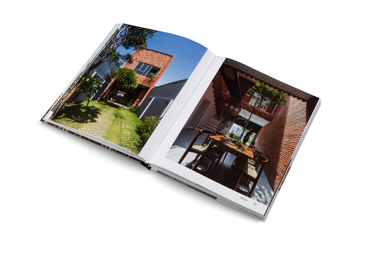 In this Vietnamese property, fish-scale tiles salvaged from the plot’s previous house are com- bined with red brickwork to create a facade that resembles the rippling skin of a sea creature. Peeking above the roofline of its neighbors, the skinny home’s red aesthetic is unashamedly bold with a dash of eccentricity. The house occupies just half the site, leaving the rest of the land for gardening and entertaining. Find out more about this project in Brick By Brick by gestalten.