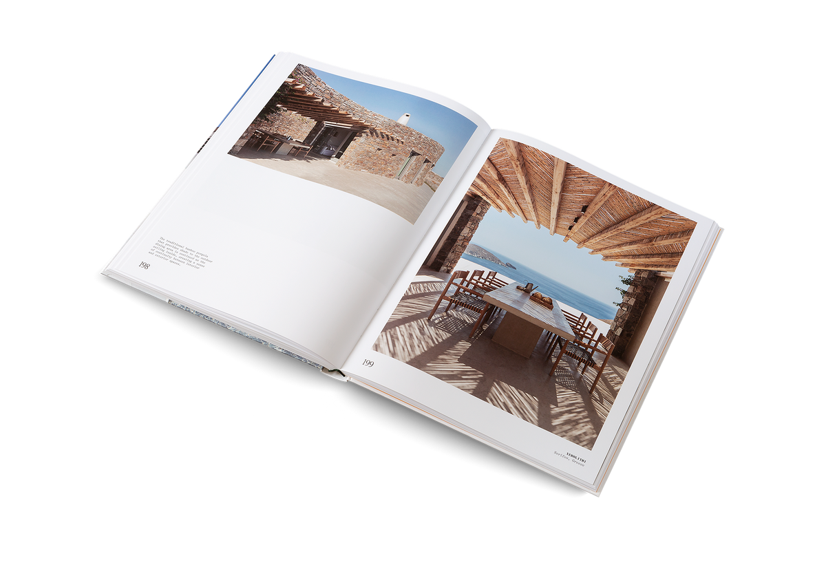 The traditional bamboo pergola that provides shade to the outdoor dining area is continued as the ceiling inside, creating a sense of continuity between interior and exterior spaces in this Mediterranean home.