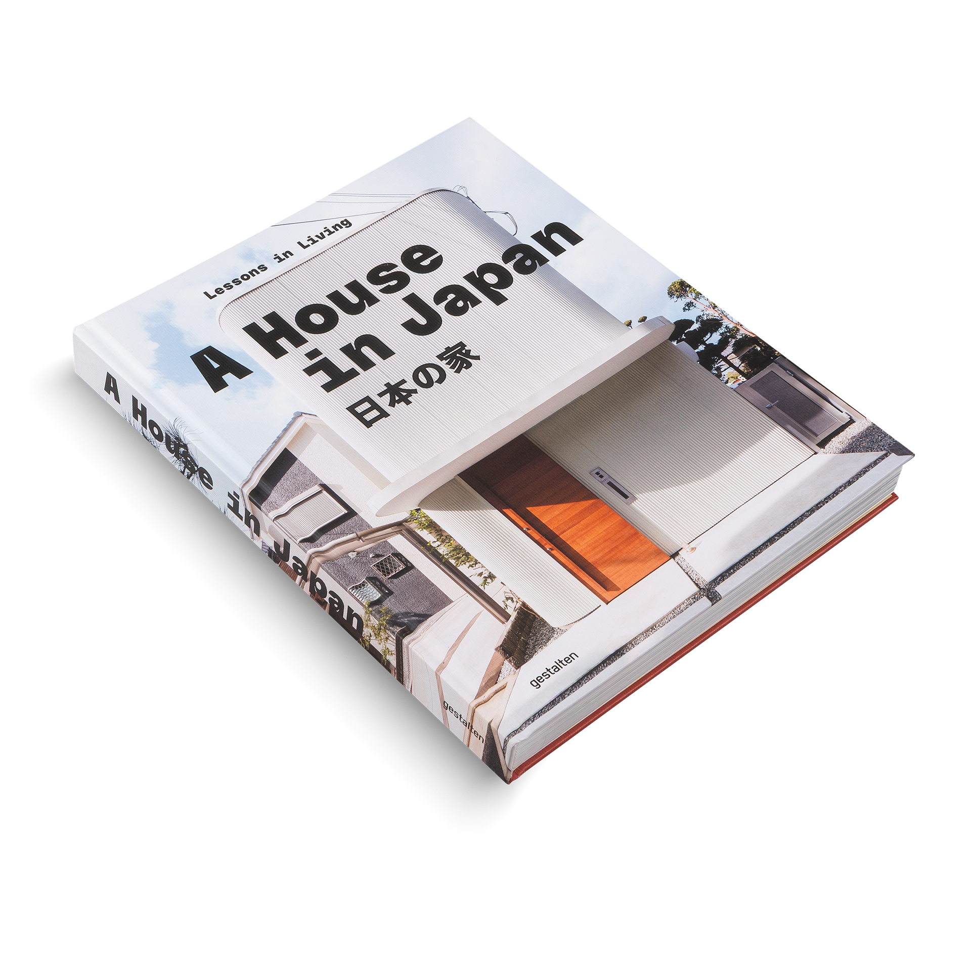 Book titled 'A House in Japan' on a white background