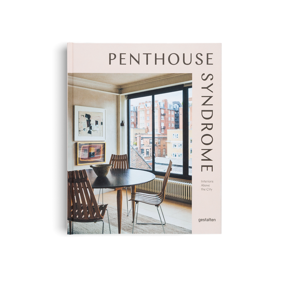 Book titled 'Penthouse Syndrome' with a dining room scene on the cover.