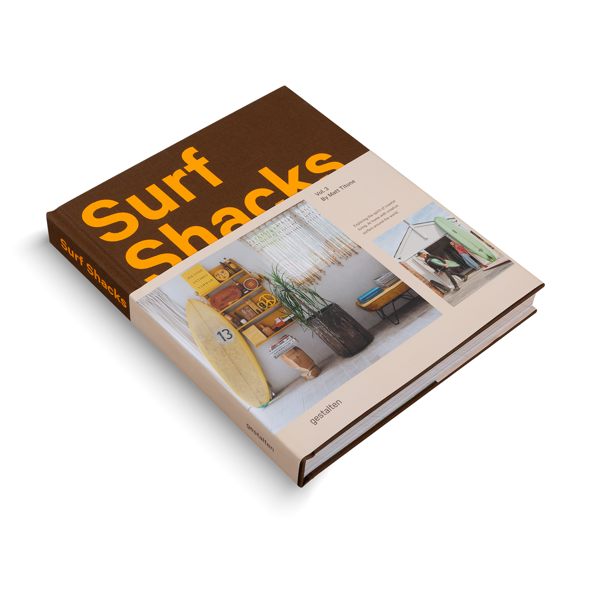 Book titled 'Surf Shacks' with a brown cover and images of surf-related interiors.
