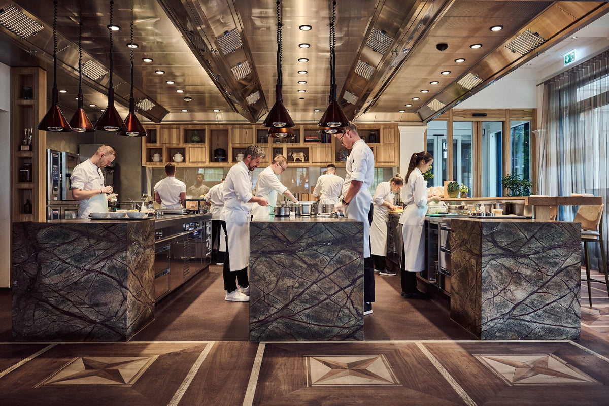 Modern kitchen with chefs working in a professional setting
