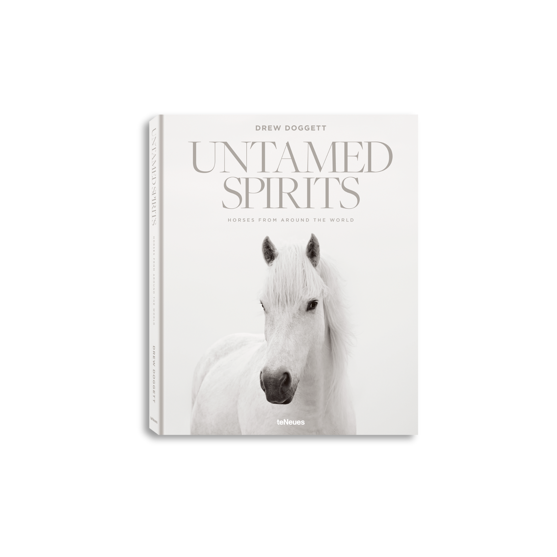 Book titled 'Untamed Spirits' with a white horse on the cover, on a white background