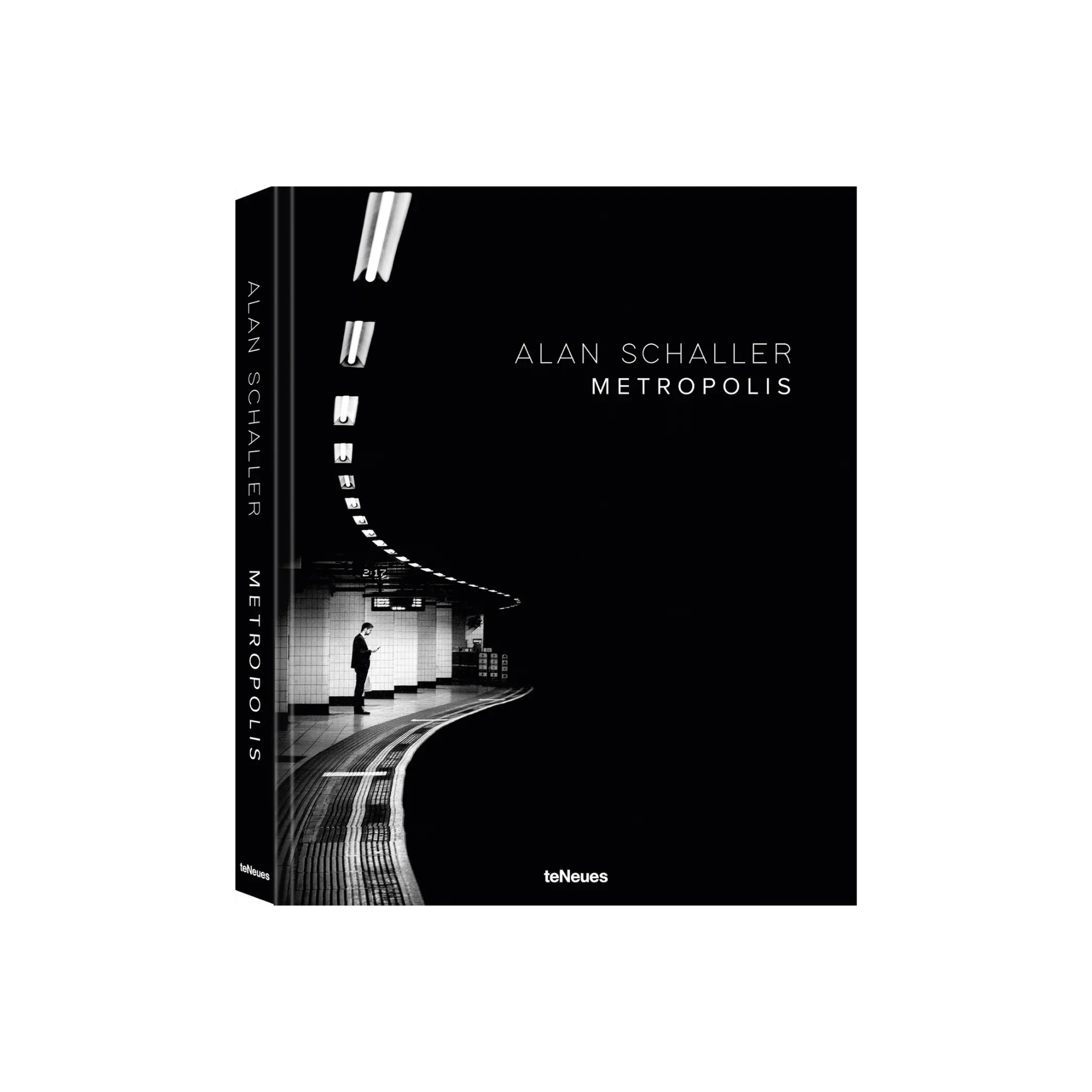 Book cover of 'Metropolis' by Alan Schaller with a black and white photo of a person in a subway station.