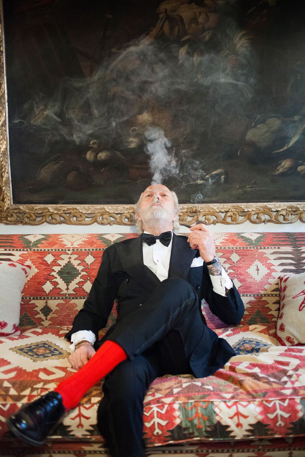 Elegant dandy on his couch