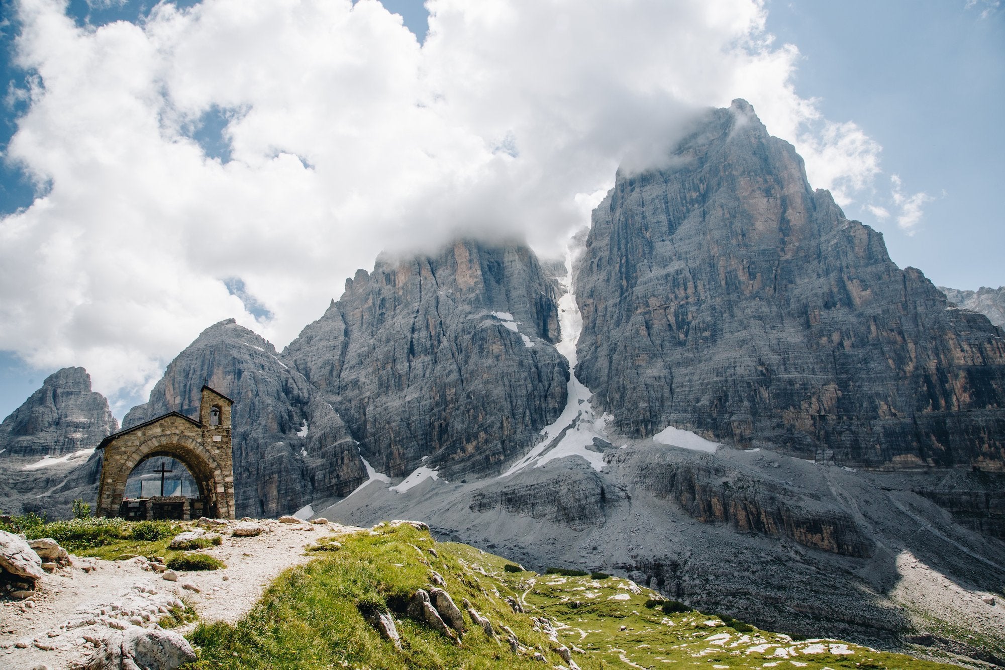 The chapel at Rifugio Brentei, looking straight ahead to the ice gully of Canalone Cima Tosa in Wanderlust Europe by gestalten