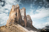 The three peaks of the dolomites in South Tyrol. Find out about the Tre Cime circuit in Wanderlust Europe by gestalten