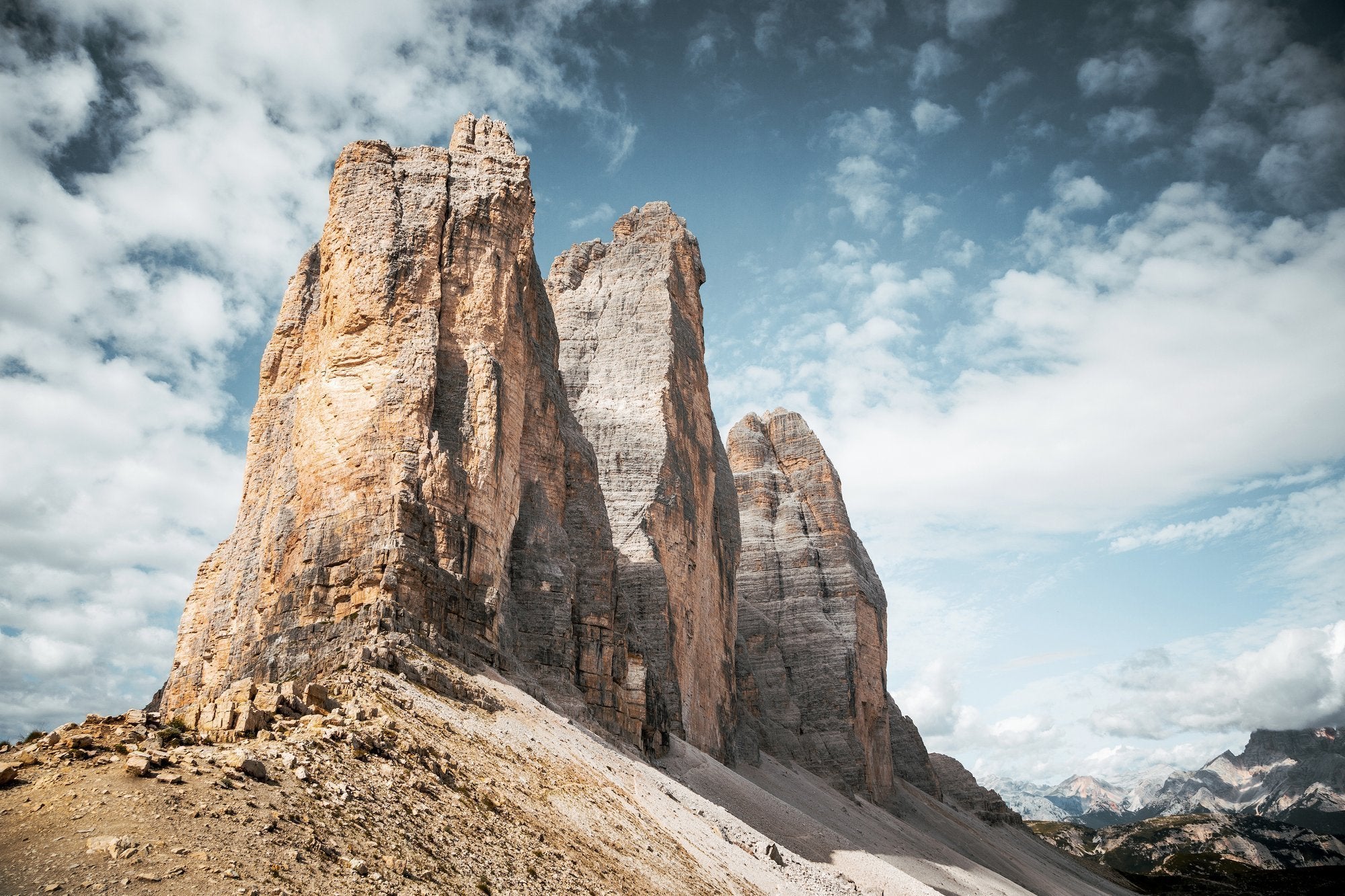 The three peaks of the dolomites in South Tyrol. Find out about the Tre Cime circuit in Wanderlust Europe by gestalten