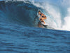 A female surfer on a wave in She Surf