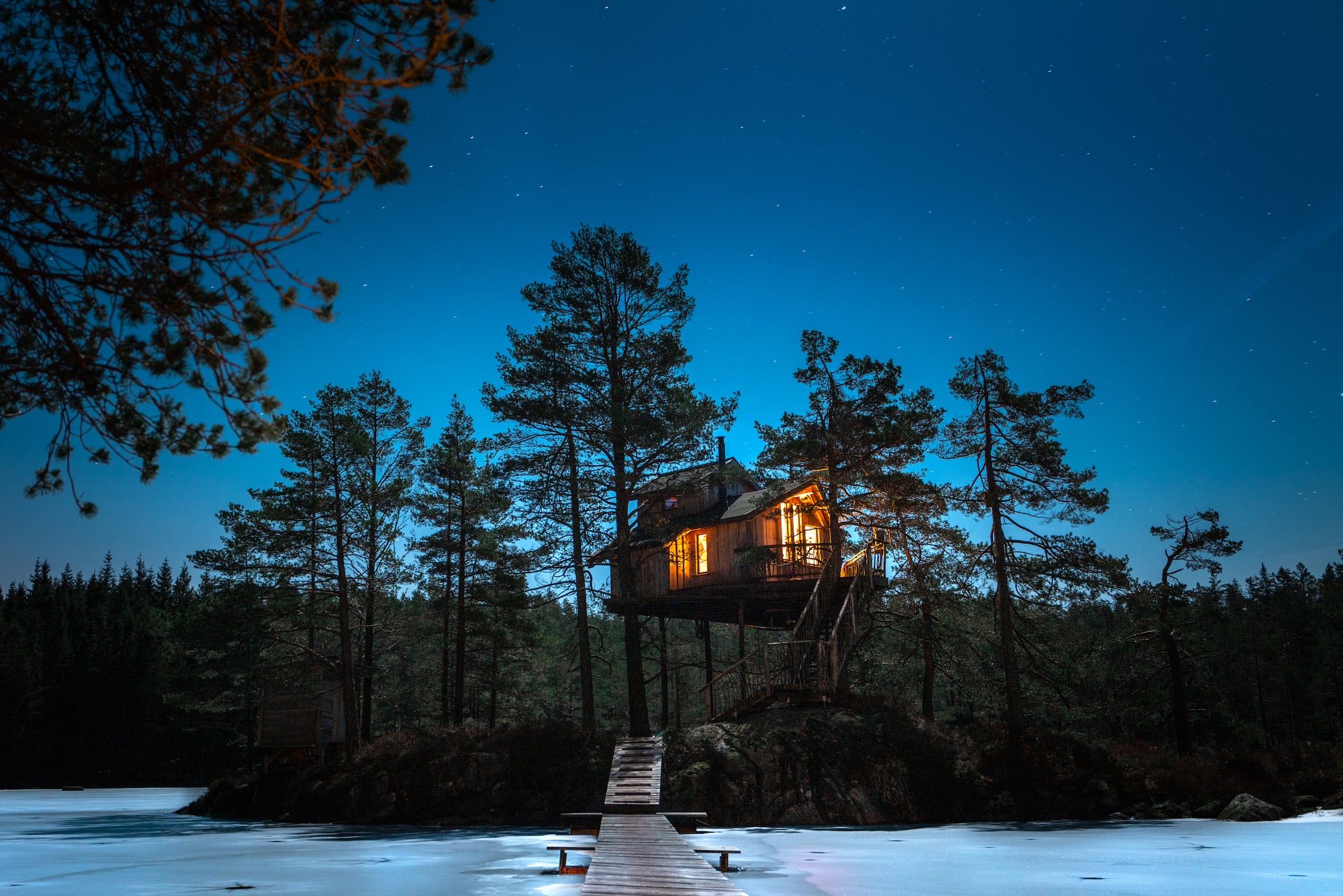 The Island Cabin in Norway is featured in Stay Wild by Canopy and Stars and gestalten. Embrace a simpler life in a treetop cabin deep in the forests of Norway.