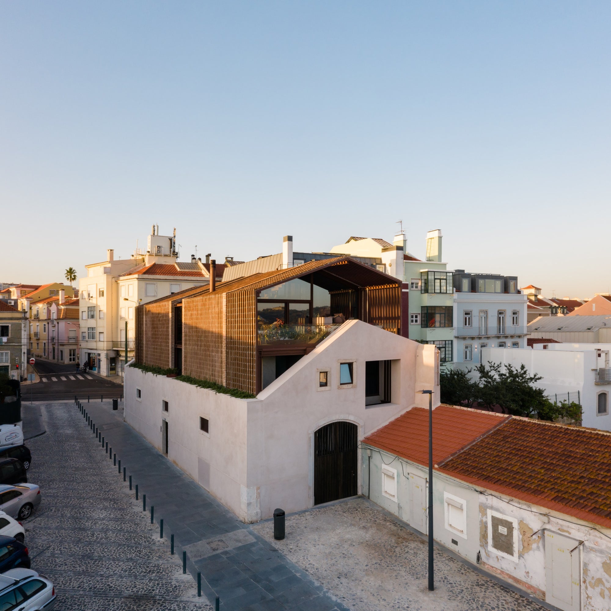 The Casa Altinho is a brickwork nestled within a former warehouse in Lisbon. This project by Antonio Costa Lima Arquitectos is featured in Brick by Brick.