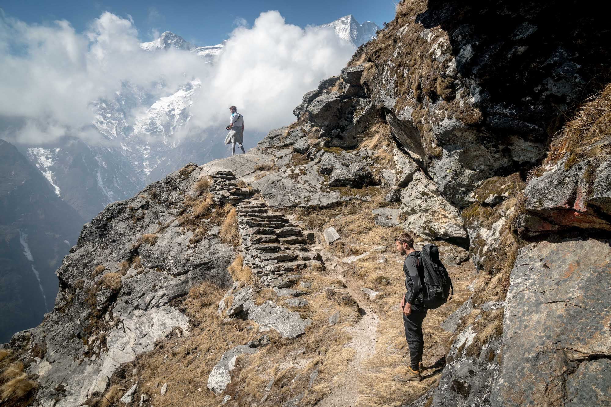 A stone stairway and a jaw-dropping Himalaya panorama on the trail to Mount Everest’s southern base camp in Wanderlust Himalaya by Cam Honan.