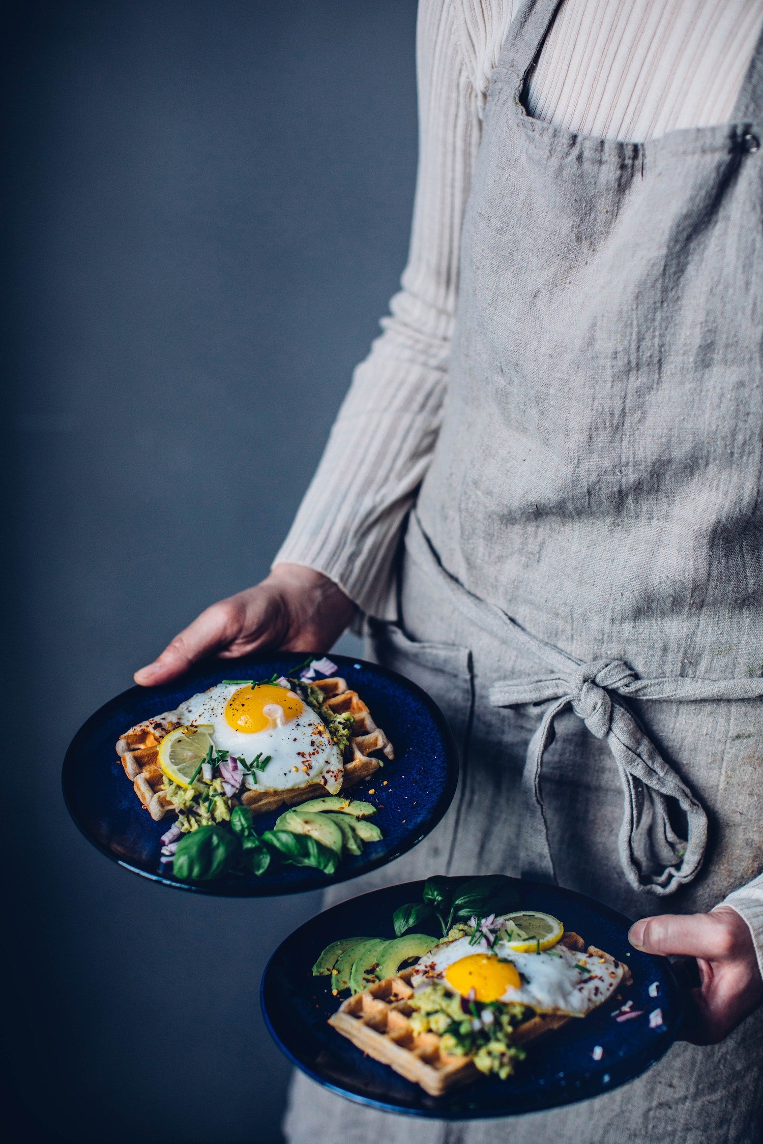 Gluten-free buckwheat waffles with guacamole and fried egg in the cookbook A Year with Our Food Stories