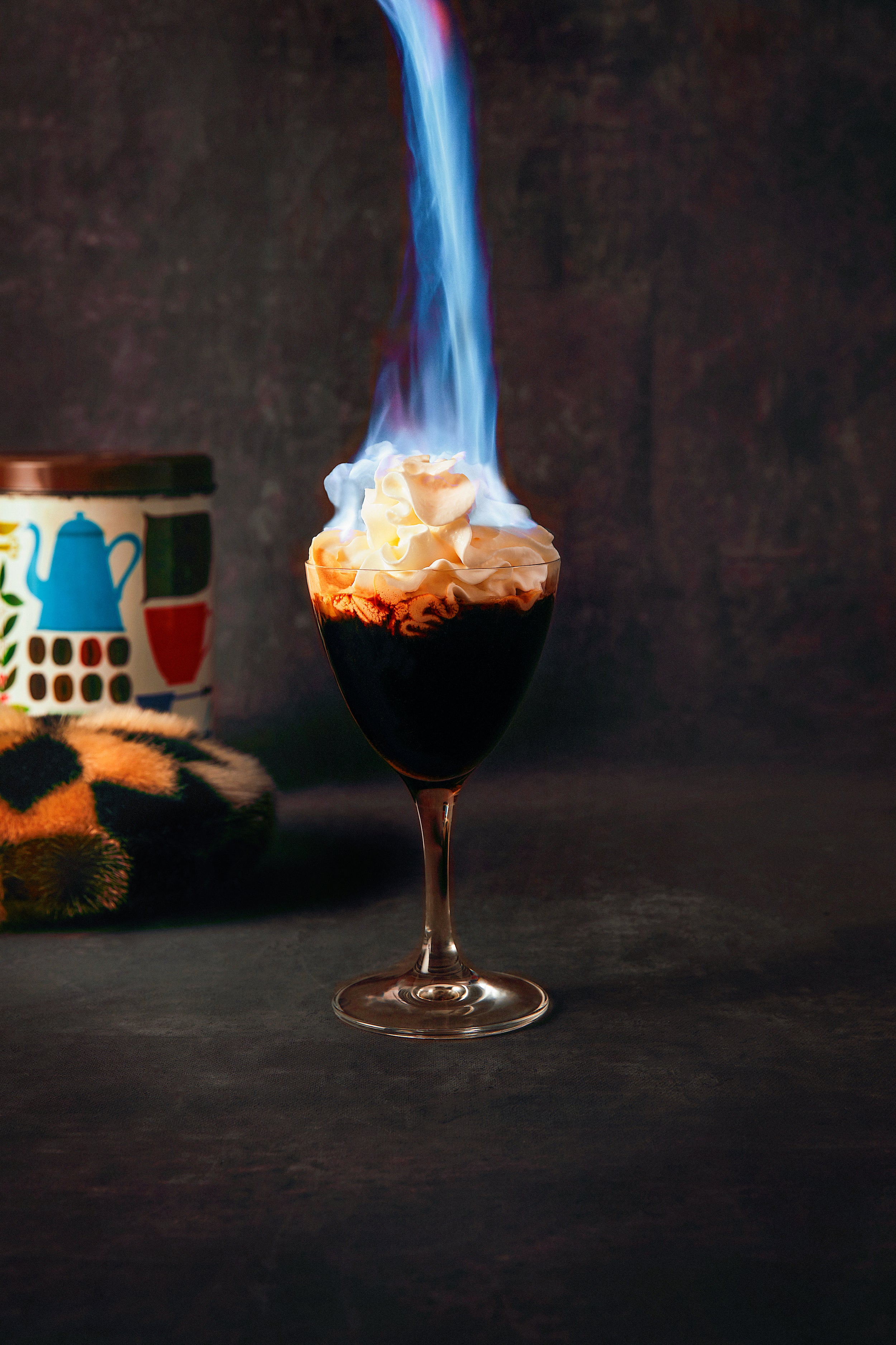 This warming blend of alcohol and coffee is the perfect antidote to a cold Arctic winter. It’s said to be representative of all parts of Greenland: whisky for the rough side, coffee liqueur for the feminine, delicate side, and orange brandy liqueur set alight and poured in a sparkling stream onto the snowy whipped cream, representing the northern lights. Discover the recipe for Greenlandic Coffee in Spill the Beans by Lani Kingston.