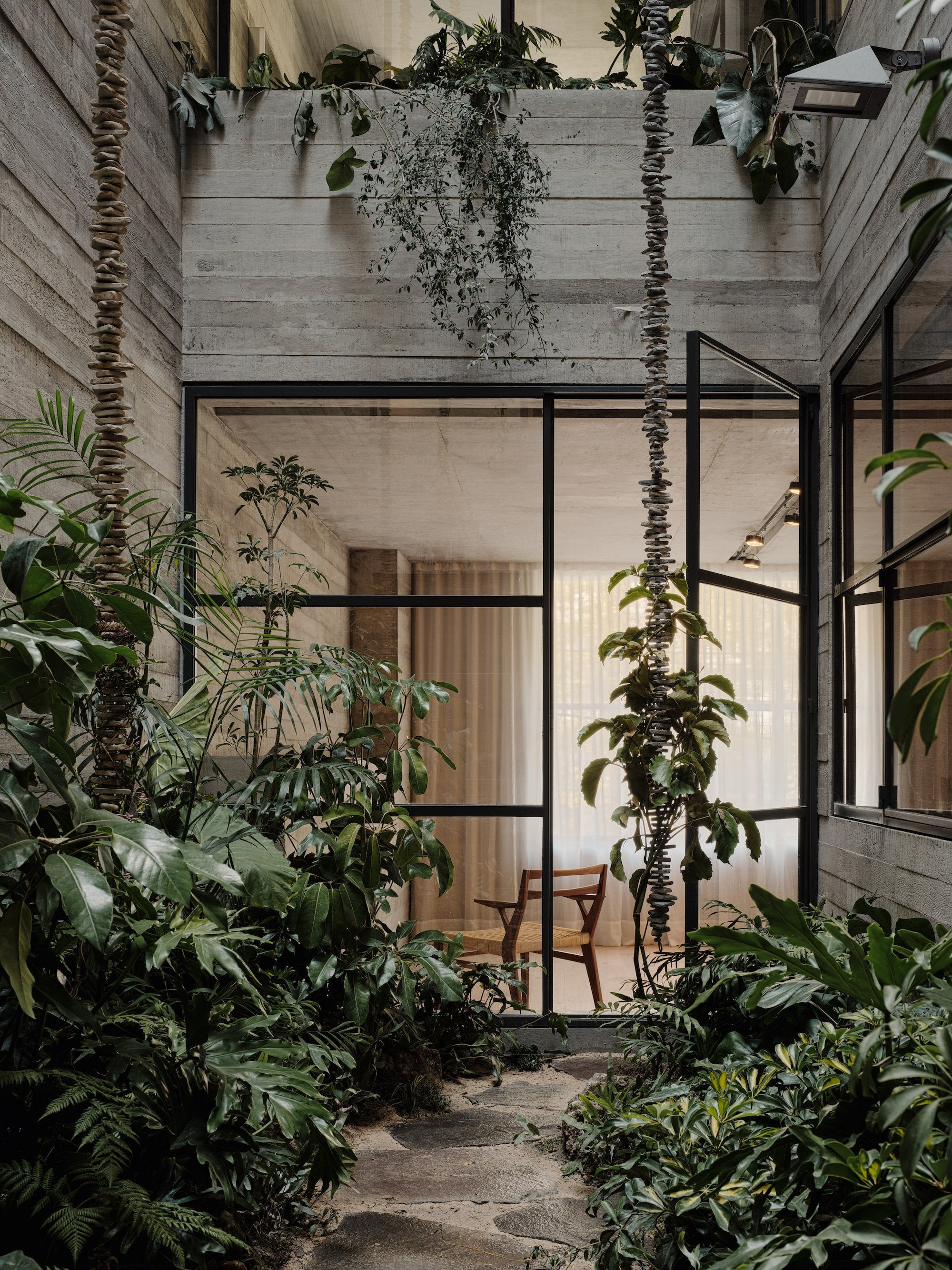 Rick Joy is known for creating beautiful buildings in wide-open expanses of desert landscape. With this project in Mexico City, he faced the opposite setting—a tight urban plot, surrounded by buildings on three sides. Despite these constraints, Tennyson 205 is a sanctuary that still captures Joy’s characteristic openness and appreciation of nature.