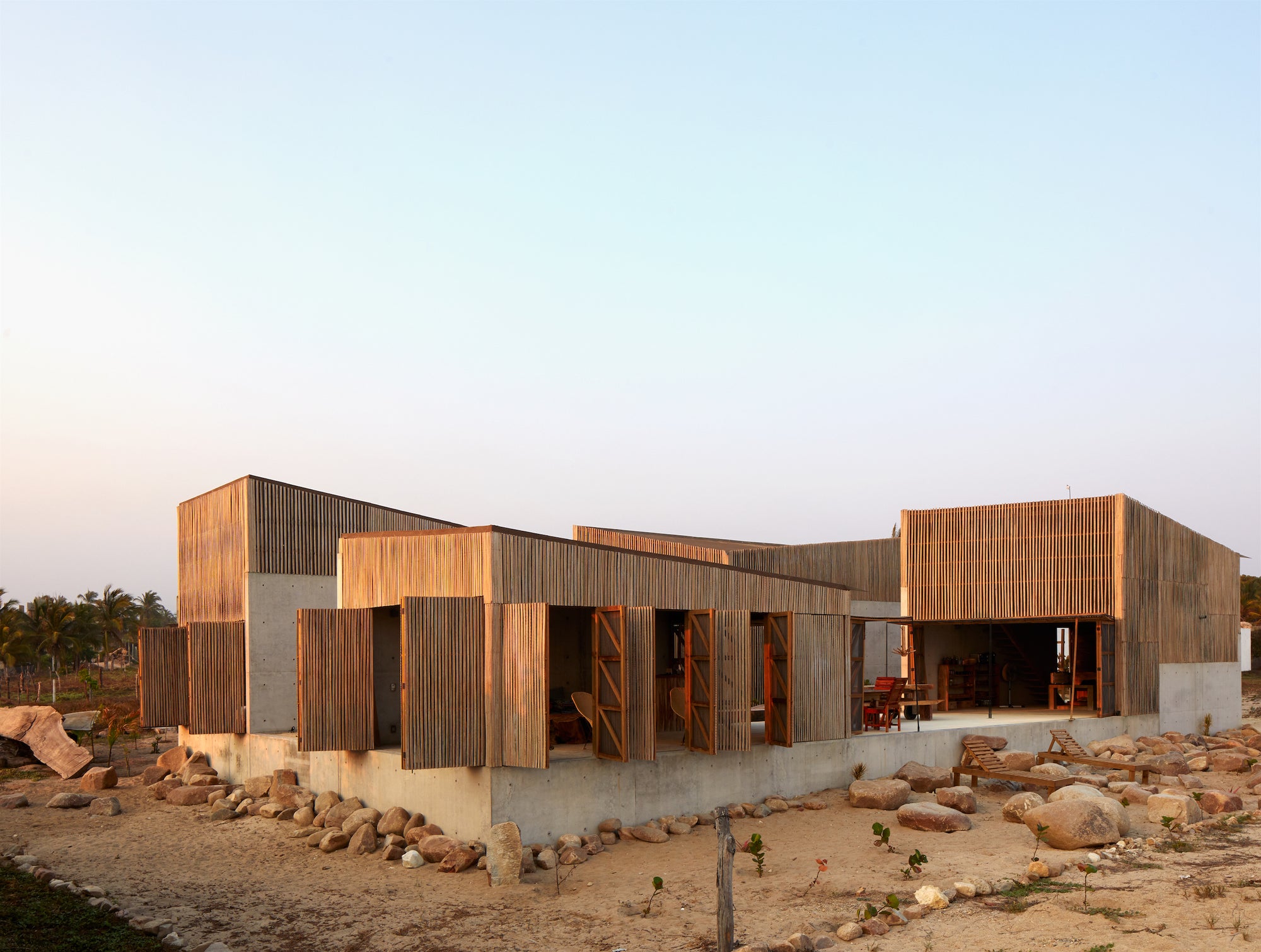 Naila House by BAAQ' is an incredible example of a modern beach house. Find out more in Life's a Beach.